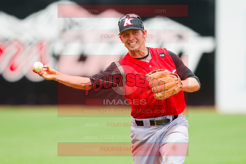 Kannapolis Intimidators shortstop Ross Wilson #17 makes a throw to first base against the Greensboro Grasshoppers at NewBridge Bank Park on May 16, 2012 in Greensboro, North Carolina. The Grasshoppers defeated the Intimidators 10-8 in 11 innings. (Brian Westerholt/Four Seam Images)