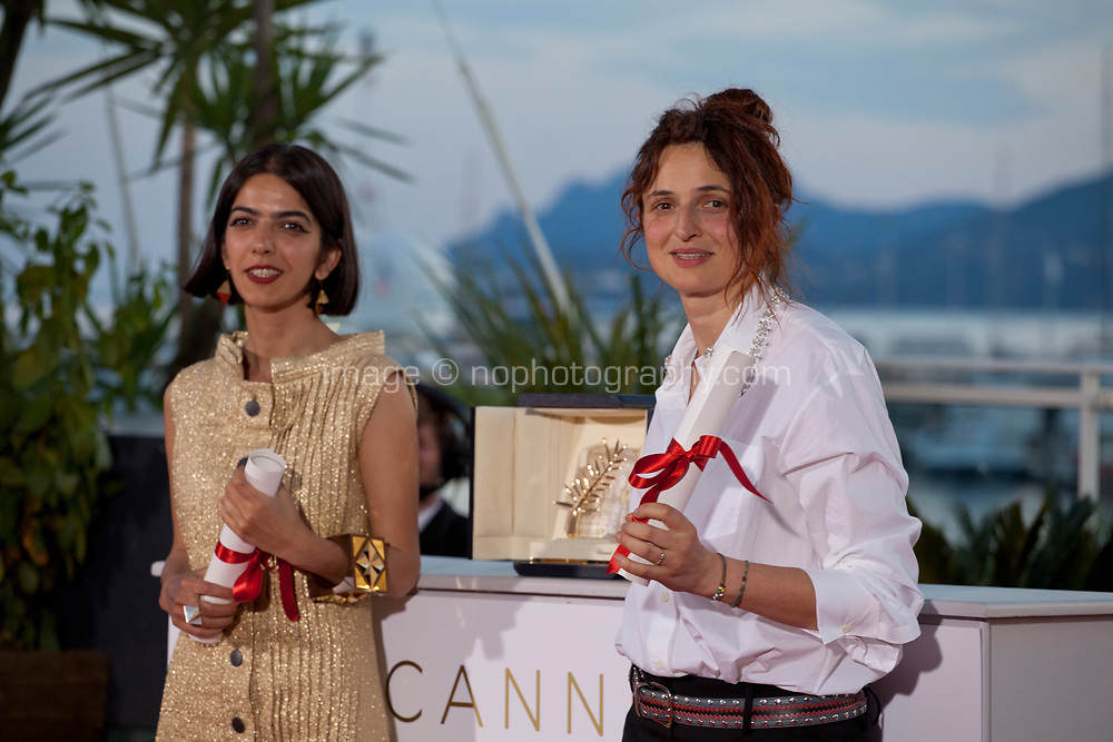 Actress Solmaz Panahi, representing her father Jafar Panahi, and Italian director Alice Rohrwacher joint winners of the Best Screenplay prize respectively for the films 3 Faces (Se Rokh) and Lazzaro Felice (Happy as Lazzaro) at the Award Winner’s photo call at the 71st Cannes Film Festival, Saturday 19th May 2018, Cannes, France. Photo credit: Doreen Kennedy
