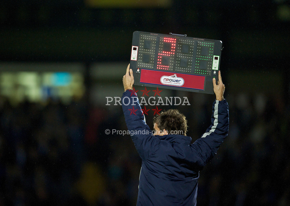 BRISTOL, ENGLAND - Tuesday, September 28, 2010: The fourth official indicates two minuets of injury time as Tranmere Rovers take on Bristol Rovers during the Football League One match at the Memorial Ground. (Photo by David Rawcliffe/Propaganda)