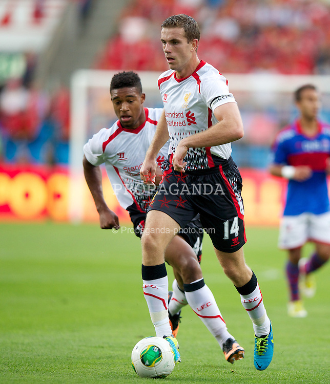 OSLO, NORWAY - Wednesday, August 7, 2013: Liverpool's Jordan Henderson in action against Valerenga during a preseason friendly match at the Ullevaal Stadion. (Pic by David Rawcliffe/Propaganda)