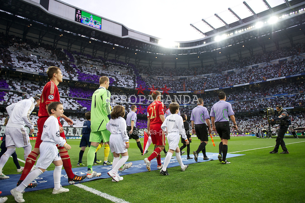 MADRID, SPAIN - Wednesday, April 25, 2012: FC Bayern Munchen's captain Philipp Lahm leads his side out to face Real Madrid during the UEFA Champions League Semi-Final 2nd Leg match at the Estadio Santiago Bernabeu. (Pic by David Rawcliffe/Propaganda)