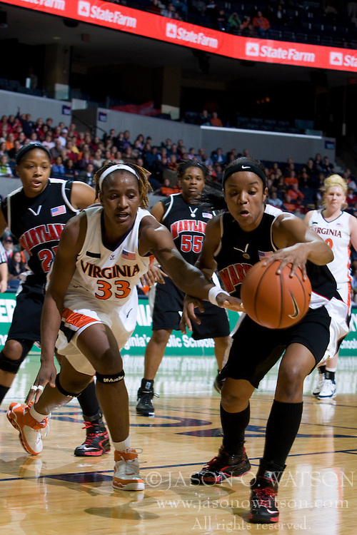Maryland forward/center Crystal Langhorne (1) and Virginia center Aisha Mohammed (33) fight for the ball. The Virginia Cavaliers women's basketball team fell to the #4 ranked Maryland Terrapins 74-62 at the John Paul Jones Arena in Charlottesville, VA on January 18, 2008.