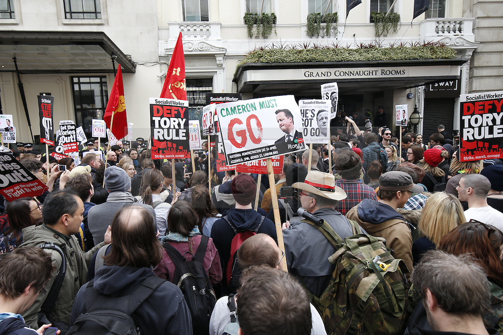 © Licensed to London News Pictures. 09/04/2016. London, UK. Protesters reach The Conservative Spring Conference. Protestors calling for reform of UK tax laws protest. Photo credit: Peter Macdiarmid/LNP