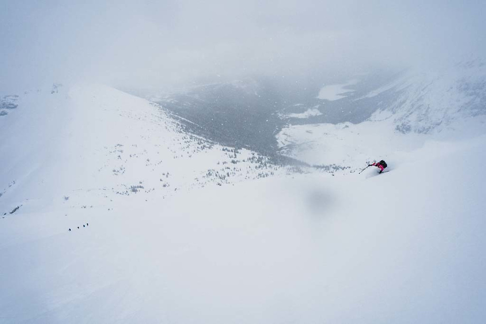 Erme Catino feels things out from Solitaire Pass, Howson Range, British Columbia.