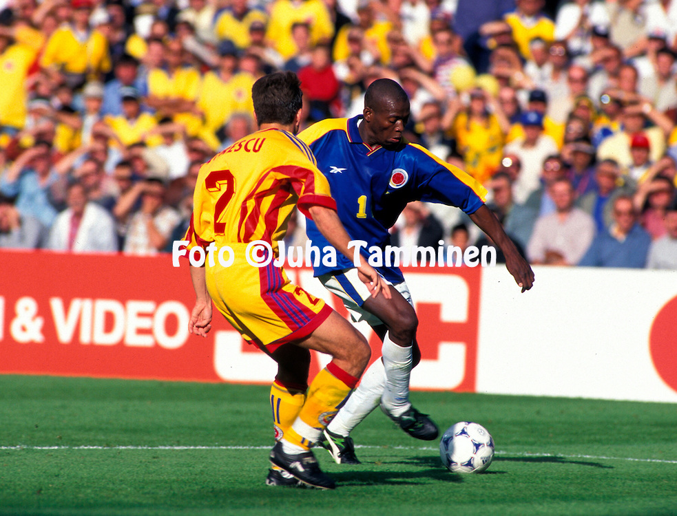 FIFA World Cup - France 1998<br />
15.6.1998, Stade Gerland, Lyon, France.<br />
Group G, Romania v Colombia.<br />
Faustino Asprilla (Colombia) v Dan Petrescu (Romania).