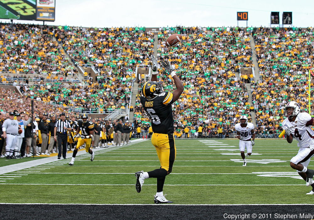 September 24, 2011: Iowa Hawkeyes wide receiver Keenan Davis (6) pulls in a 23 yard touchdown catch during the third quarter of the game between the Iowa Hawkeyes and the Louisiana Monroe Warhawks at Kinnick Stadium in Iowa City, Iowa on Saturday, September 24, 2011. Iowa defeated Louisiana Monroe 45-17.