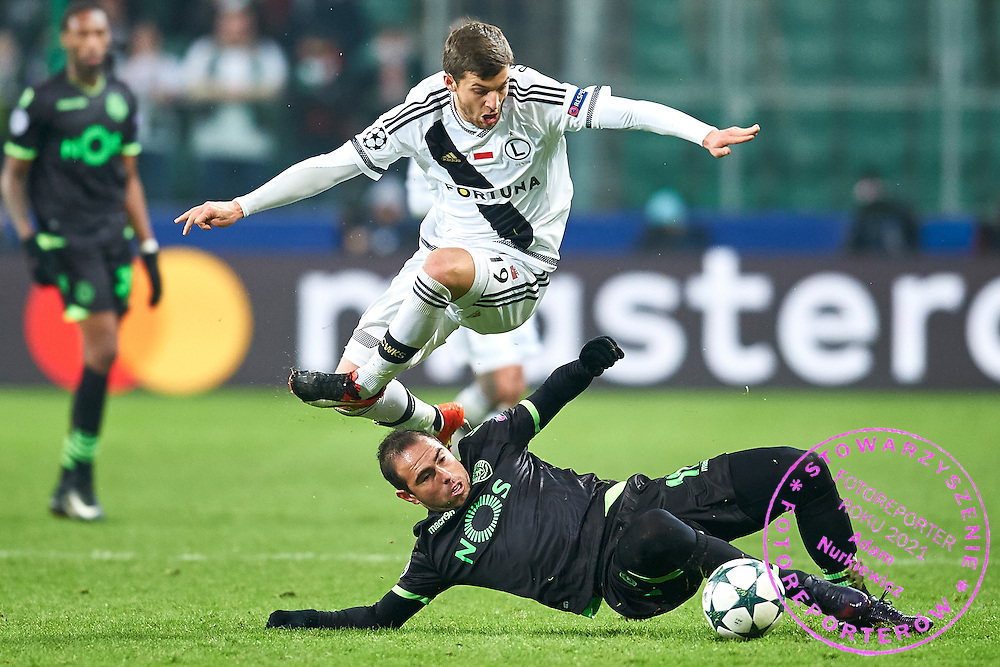 Warsaw, Poland - 2016 December 07: (L) Bartosz Bereszynski of Legia Warsaw fights for the ball with (R) Bruno Cesar of Sporting CP during soccer match Legia Warszawa v Sporting Clube de Portugal - UEFA Champions League Group F at Municipal Stadium on December 07, 2016 in Warsaw, Poland.<br />
<br />
Adam Nurkiewicz declares that he has no rights to the image of people at the photographs of his authorship.<br />
<br />
Picture also available in RAW (NEF) or TIFF format on special request.<br />
<br />
Any editorial, commercial or promotional use requires written permission from the author of image.<br />
<br />
Mandatory credit:<br />
Photo by © Adam Nurkiewicz / Mediasport