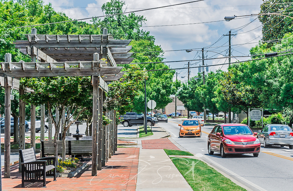 Traffic passes through downtown Chamblee, June 10, 2014, in Chamblee, Georgia. Chamblee was incorporated in 1907 and had a population of 9,892 people at the time of the 2010 U.S. Census. The city's motto is, "A City on the Right Track." (Photo by Carmen K. Sisson/Cloudybright)