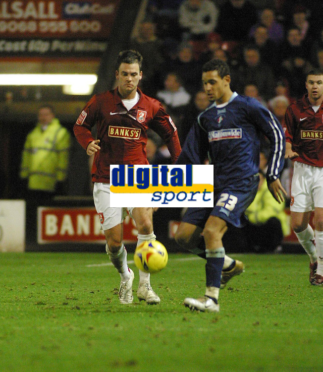 Photo: Dave Linney.<br />
Walsall v Swindon Town. Coca Cola League 2. 09/12/2006.<br />
Walsall's Daniel Fox(L) closes in on Curtis Weston.