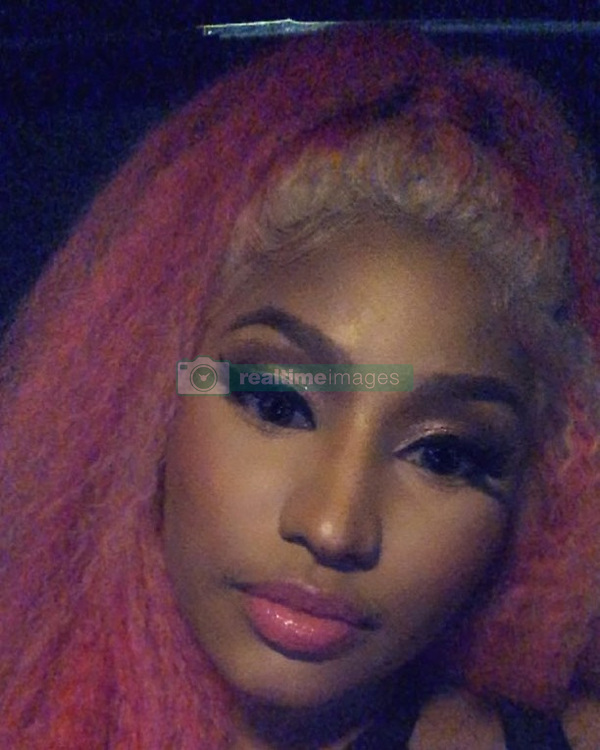 Nicki Minaj releases a photo on Instagram with the following caption: "#Melbourne see you in a few hours!!! #FOMO FESTIVAL #AUSTRALIA \ud83c\udde6\ud83c\uddfa yes I know I sound like a man right now, I\u2019m sick \ud83e\udd74". Photo Credit: Instagram *** No USA Distribution *** For Editorial Use Only *** Not to be Published in Books or Photo Books *** Please note: Fees charged by the agency are for the agency’s services only, and do not, nor are they intended to, convey to the user any ownership of Copyright or License in the material. The agency does not claim any ownership including but not limited to Copyright or License in the attached material. By publishing this material you expressly agree to indemnify and to hold the agency and its directors, shareholders and employees harmless from any loss, claims, damages, demands, expenses (including legal fees), or any causes of action or allegation against the agency arising out of or connected in any way with publication of the material.