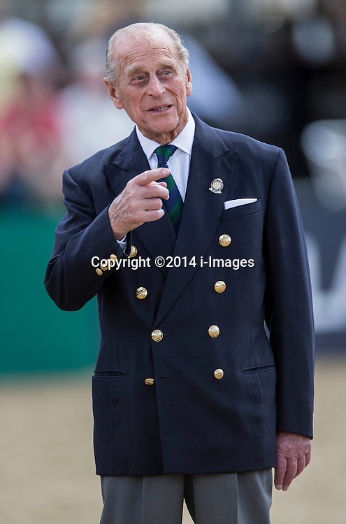 Prince Philip presents the prizes for the Driving for the Disabled class at the Windsor Horse Show today. Windsor Horse Show, Windsor, United Kingdom. Thursday, 15th May 2014. Picture by i-Images