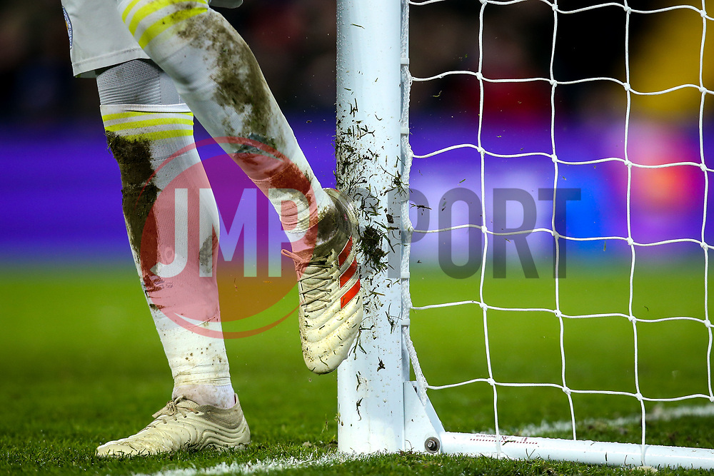 Kasper Schmeichel of Leicester City cleans his boots clean on the goal post - Mandatory by-line: Robbie Stephenson/JMP - 30/01/2019 - FOOTBALL - Anfield - Liverpool, England - Liverpool v Leicester City - Premier League