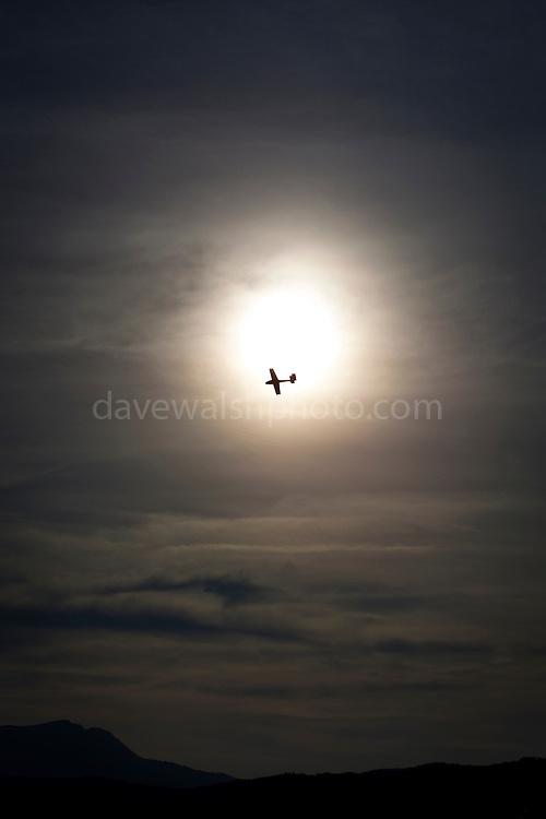 A glider flies past the sun at Cap Bear, near Port Vendres, France. This mage can be licensed via Millennium Images. Contact me for more details, or email mail@milim.com For prints, contact me, or click "add to cart" to some standard print options.