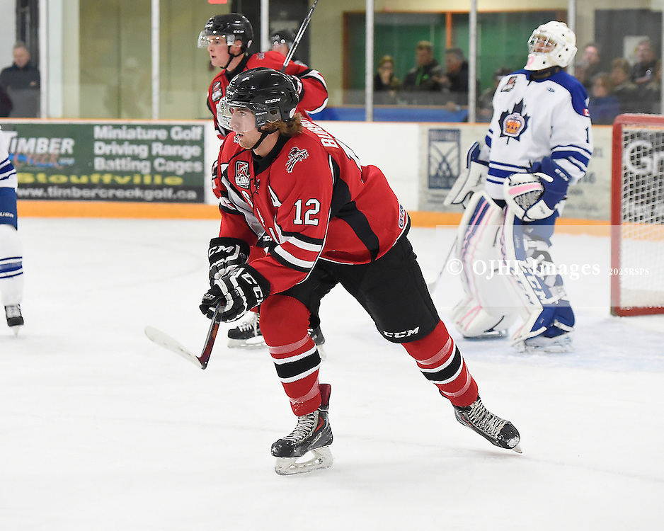 STOUFFVILLE, ON - Oct 3, 2015 : Ontario Junior Hockey League game action between Markham and Stouffville, Rory Milne #12 of the Cobourg Cougars pursues the play during the first period.<br />
(Photo by Andy Corneau / OJHL Images)