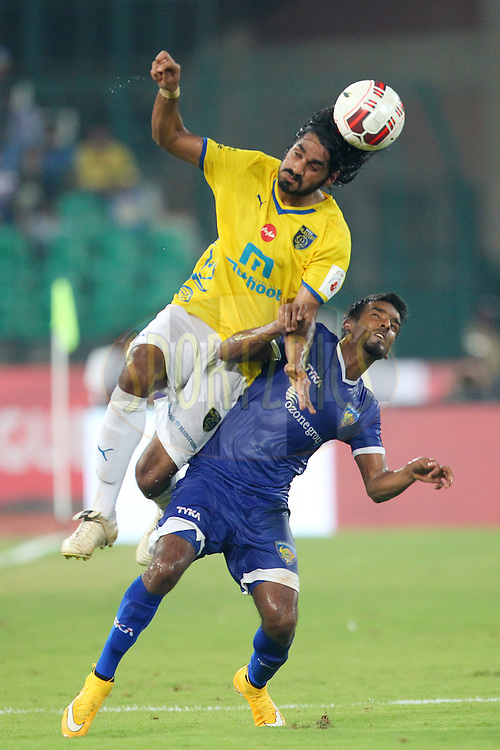 Sandesh Jhingan of Kerala Blasters FC and Abhishek Das of Chennaiyin FC challenge for the high ball during match 9 of the Hero Indian Super League between Chennaiyin FC and Kerala Blasters FC held at the Jawaharlal Nehru Stadium, Chennai, India on the 21st October 2014.<br />
<br />
Photo by: Ron Gaunt/ ISL/ SPORTZPICS