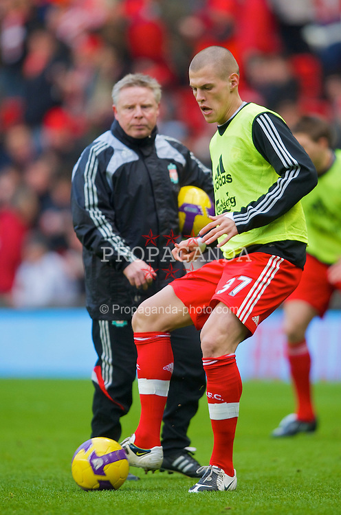 LIVERPOOL, ENGLAND - Sunday, February 1, 2009: Liverpool's Martin Skrtel warms up with assistant manager Sammy Lee before his side's Premiership match against Chelsea at Anfield. (Mandatory credit: David Rawcliffe/Propaganda)