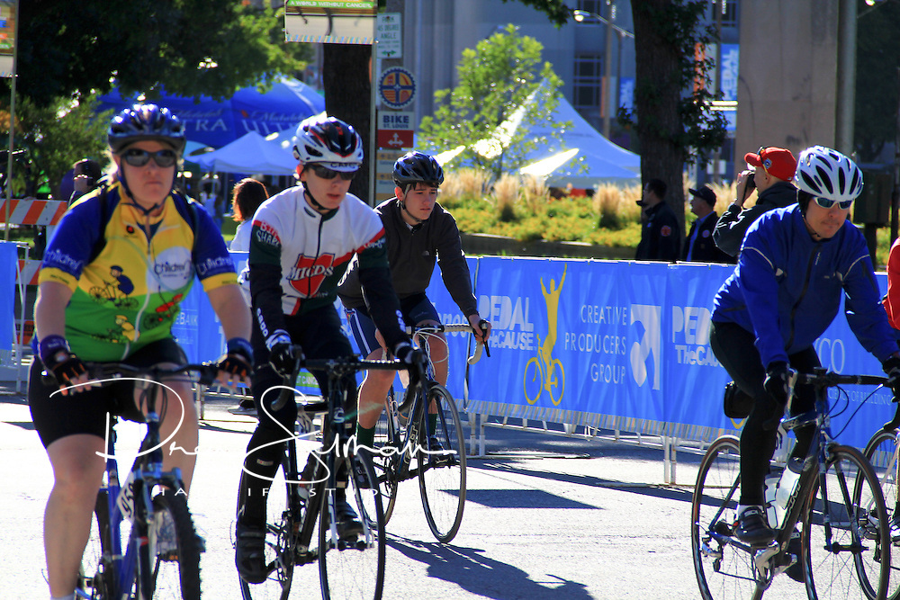 OCT 03, 2011 (ST LOUIS) -- Riders starting the 15 and 25 mile course at the 2011 Pedal the Cause event in downtown St. Louis. The ride had 1,300 riders and has raised over $1.25 million in donations to funder cancer research at Washington University, Barnes Jewish Medical Center and the St Louis Children's Hospital. All proceeds raised during the ride stay in St Louis.