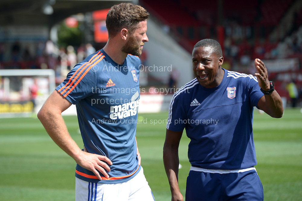Terry Connor, the Ipswich Town assistant manager (r) gives instructions to Daryl Murphy of Ipswich Town during pre-match warm up. Skybet football league Championship match, Brentford v Ipswich Town at Griffin Park in London on Saturday 8th August 2015.<br />
pic by John Patrick Fletcher, Andrew Orchard sports photography.