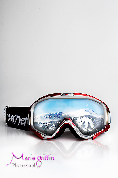 A composite photo illustration photographed in the studio then combined a photo of the slopes in Breckenridge, Colo. from istock with the ski mask for the tracks story: Kick off ski season with the latest in gear/goods. In these tough economic times, we'll target a lot of lower-priced items.<br />
Marie G Dennis/Marie Griffin Photography