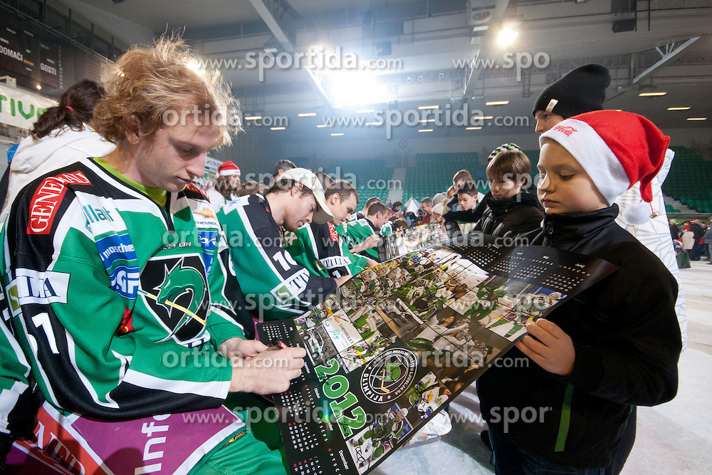 Santa Clause for kids after ice-hockey match between HDD Tilia Olimpija and EHC LIWEST Linz in 35th Round of EBEL league, on December 30, 2011 at Hala Tivoli, Ljubljana, Slovenia. (Photo By Matic Klansek Velej / Sportida)