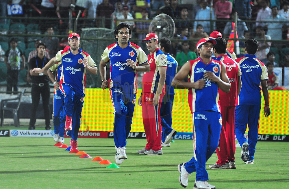 RCB player Zaheer Khan warmup with team players during match 30 of the the Indian Premier League ( IPL) 2012 between The Rajasthan Royals and the Royal Challengers Bangalore held at the Sawai Mansingh Stadium in Jaipur on the 23rd April 2012Photo by Arjun Panwar/IPL/SPORTZPICS