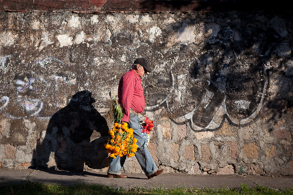 In the town of Comanja, Michoacan, locals celebrate "Dia de los Muertos" (Day of the Dead) on Nov. 2, 2011. The ritual has profound significance for the local people who celebrate deceased loved ones on the cheerful and solemn occasion. ..©Benjamin B Morris