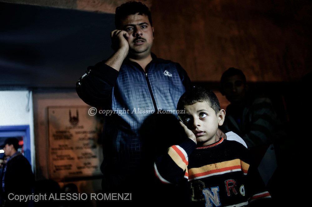 Gaza City: A lightly wounded child is seen after he received medications at Al Shifa hospital in Gaza. November 17, 2012. ALESSIO ROMENZI