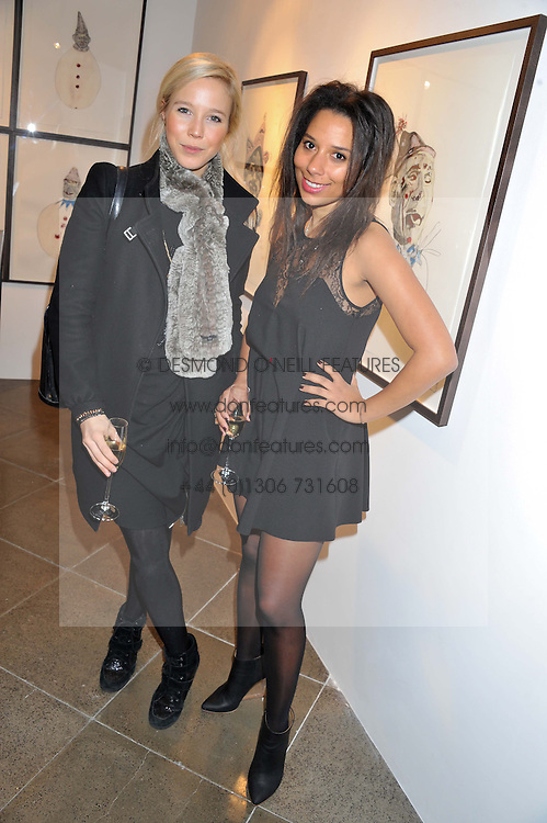Left to right, KENDAL OWENS and AJ JACOBS at a private view of jewellery by Eugenie Nairchos and Noor Fares entitled Galactic Garden held at Shizaru Mayfair, 112 Mount Street, London on 5th December 2012.