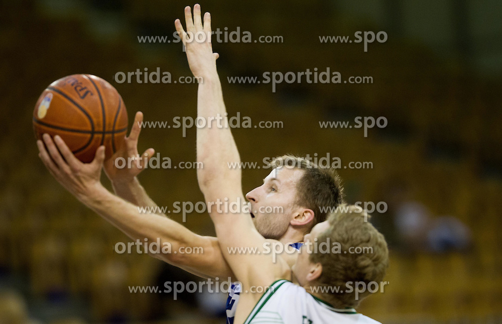 Tadej Horvat of Elektra vs Jaka Blazic of Olimpija during basketball match between KK Union Olimpija and KK Elektra Sostanj in 6th Round of Telemach League for Slovenian National Champion 2011/12, on April 12, 2012, in Hala Tivoli, Ljubljana, Slovenia. (Photo by Vid Ponikvar / Sportida.com)