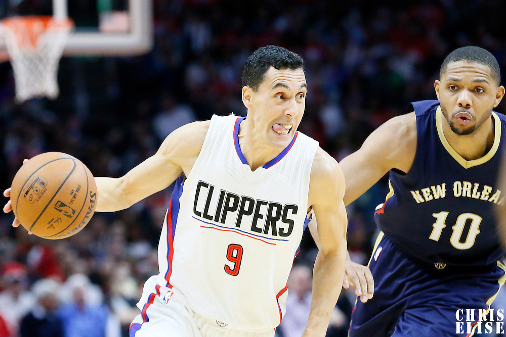 10 January 2016: Los Angeles Clippers guard Pablo Prigioni (9) drives past New Orleans Pelicans guard Eric Gordon (10) during the Los Angeles Clippers 114-111 overtime victory over the New Orleans Pelicans, at the Staples Center, Los Angeles, California, USA.