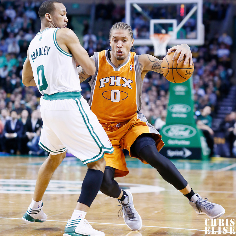 09 January 2013: Phoenix Suns small forward Michael Beasley (0) drives past Boston Celtics point guard Avery Bradley (0) during the Boston Celtics 87-79 victory over the Phoenix Suns at the TD Garden, Boston, Massachusetts, USA.
