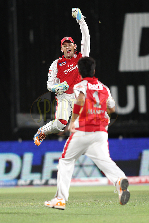 Captain Adam Gilchrist of the Kings XI Punjab celebrates after catching Chris Gayle of the Royal Challengers Bangalore during match 63 of the Indian Premier League ( IPL ) Season 4 between the Kings XI Punjab and the Royal Challengers Bangalore held at the The HPCA Stadium in Dharamsala, Himachal Pradesh, India on the 17th May 2011..Photo by Shaun Roy/BCCI/SPORTZPICS