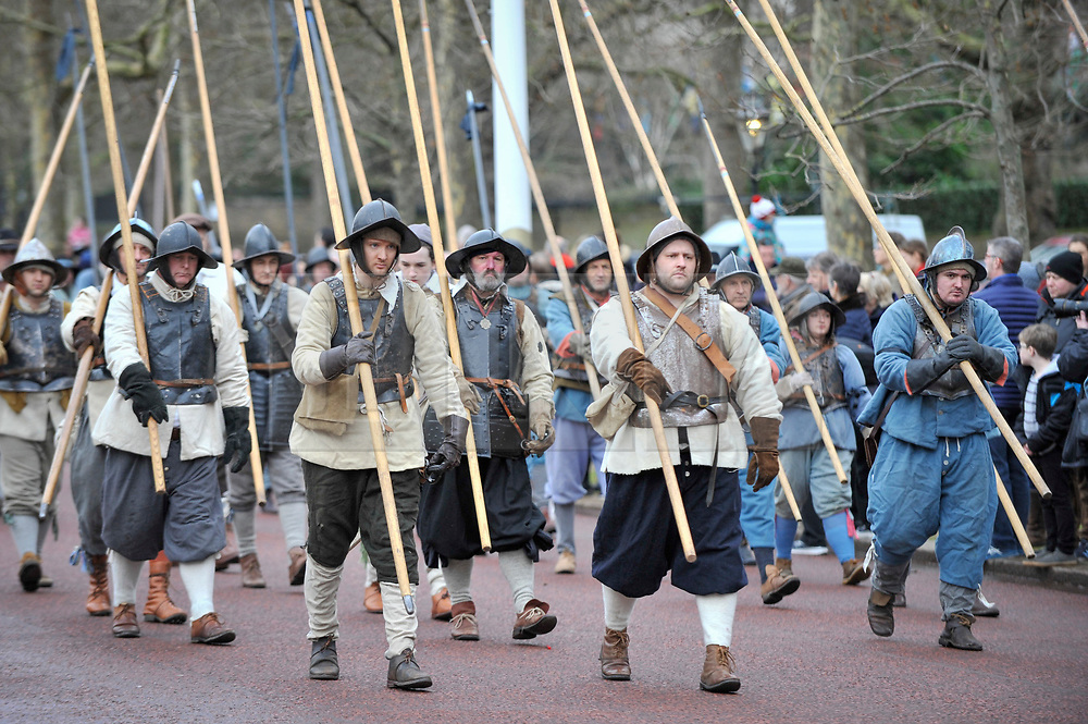 © Licensed to London News Pictures. 28/01/2018. LONDON, UK. Members of The English Civil War Society, one of the oldest re-enactment groups in the world, bring to life The King's Army (the Royalist half of the English Civil War Society) as they retrace the route taken by King Charles I from St James Palace to the place of his execution at the Banqueting House in Whitehall. Photo credit: Stephen Chung/LNP