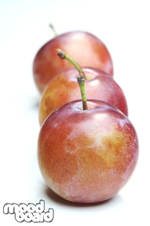 Plums on white bacground - close-up