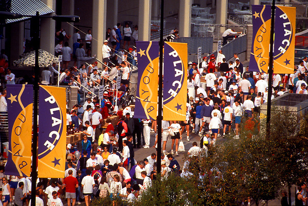 Stock photo of people gathered for the Bayou Place Street Festival in downtown Houston Texas