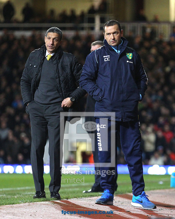 Picture by Paul Chesterton/Focus Images Ltd +44 7904 640267<br />
11/02/2014<br />
Norwich Manager Chris Hughton and Norwich Assistant Manager Colin Calderwood look dejected during the Barclays Premier League match at the Boleyn Ground, London