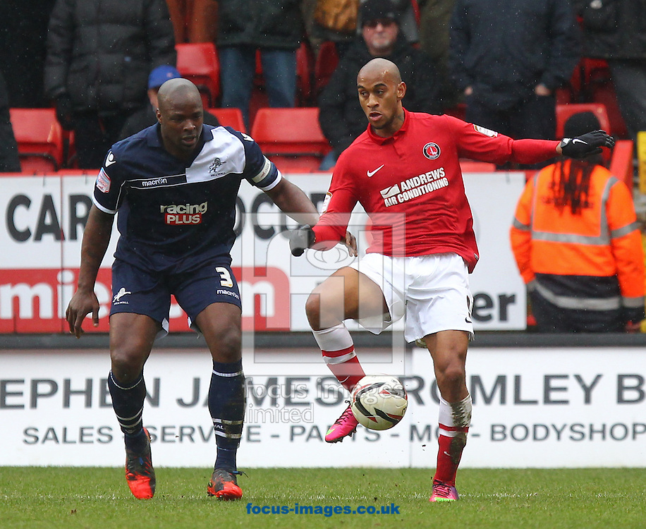 Picture by John Rainford/Focus Images Ltd +44 7506 538356.16/03/2013.Danny Haynes of Charlton Athletic and Danny Shittu of Millwall during the npower Championship match at The Valley, London.