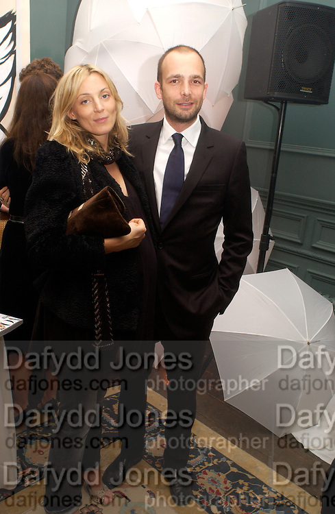 Phoebe Philo and Max Wigram, The Vogue List, celebrated by Vogue and Motorola. 33 Portland Place. 3 November 2004. ONE TIME USE ONLY - DO NOT ARCHIVE © Copyright Photograph by Dafydd Jones 66 Stockwell Park Rd. London SW9 0DA Tel 020 7733 0108 www.dafjones.com