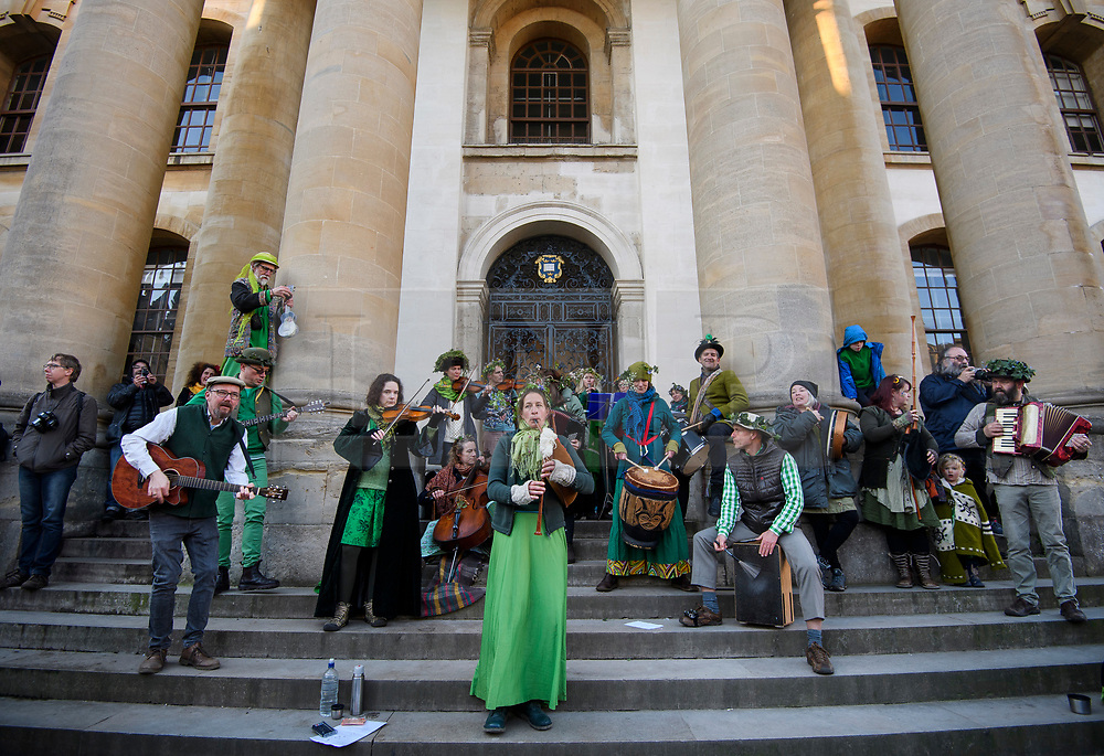 © Licensed to London News Pictures. 01/05/2018. Oxford, UK. A band performs traditional music outside the Clarendon Building at Oxford University during celebrations for May Day in the early hours of the morning. Students were again prevented from jumping from Magdalen Bridge in to the river, which has historically been a tradition, due to injuries at a previous years event . Photo credit: Ben Cawthra/LNP