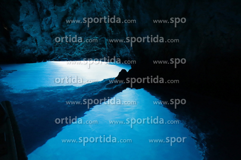 THEMENBILD - Die kroatische Insel Bisevo in der Adria ist bekannt für ihre vielen Höhlen. Die bekannteste Höhle ist die blaue Grotte, besonders schön sind dort die Lichteffekte, die durch die Brechung der Sonnenstrahlen an der Wasseroberfläche entstehen. Aufgenommen am 24. August 2013 // THEMES PICTURE - The Croatian island in the Adriatic Bisevo is known for its many caves. The most famous cave is the Blue Grotto, there are the most beautiful light effects that occur at the surface due to the refraction of the sun's rays. Pictured on 24th of August 2013. EXPA Pictures © 2013, PhotoCredit: EXPA/ Pixsell/ Dalibor Urukalovic<br />
<br />
***** ATTENTION - for AUT, SLO, SUI, ITA, FRA only *****
