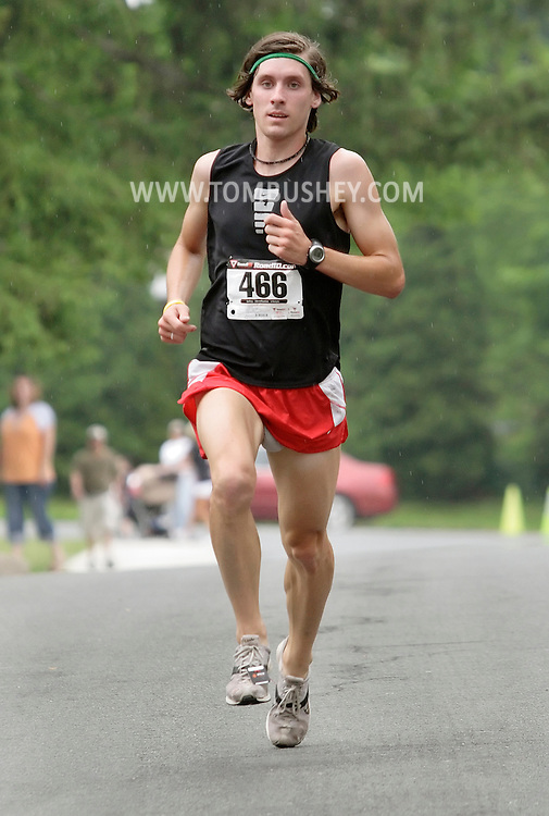 Middletown, New York - Runners compete in the Ruthie Dino Marshall 5K race sponsored by the Middletown YMCA on June 6, 2010.