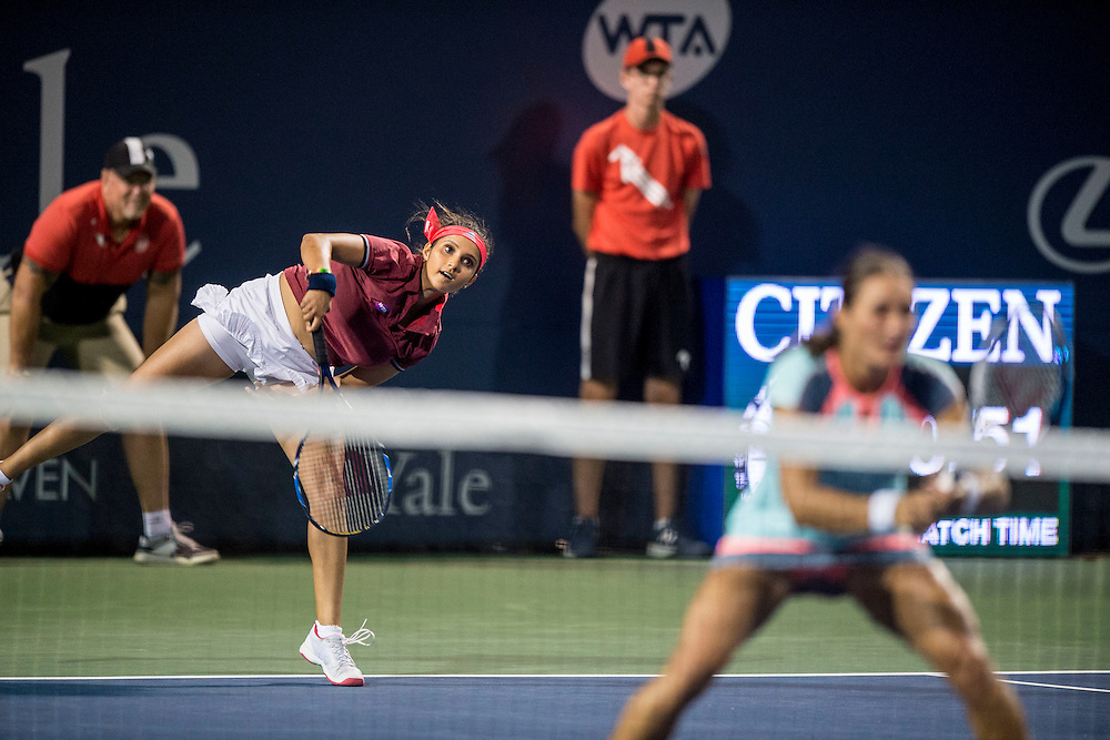 August 24, 2016, New Haven, Connecticut: <br />
Sania Mirza of India and Monica Niculescu of Romania in action during Day 6 of the 2016 Connecticut Open at the Yale University Tennis Center on Wednesday, August 24, 2016 in New Haven, Connecticut. <br />
(Photo by Billie Weiss/Connecticut Open)