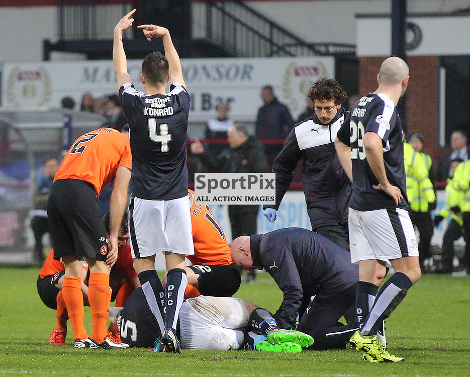 Dundee v Dundee United Scottish Premiership 2 January 2016; James McPake (Dundee, 5) suffers a serious knee injury in a challenge with John Rankin (Dundee United, 8) during the Dundee v Dundee United Scottish Premiership match played at Dens Park Stadium;