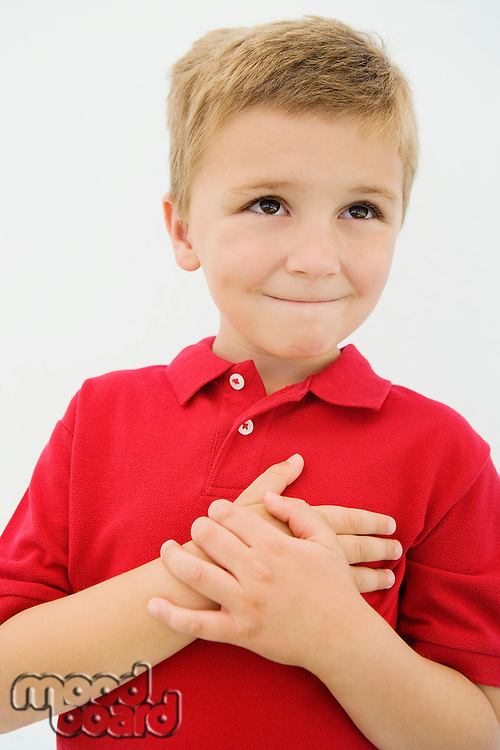 Boy with Hand Over Heart