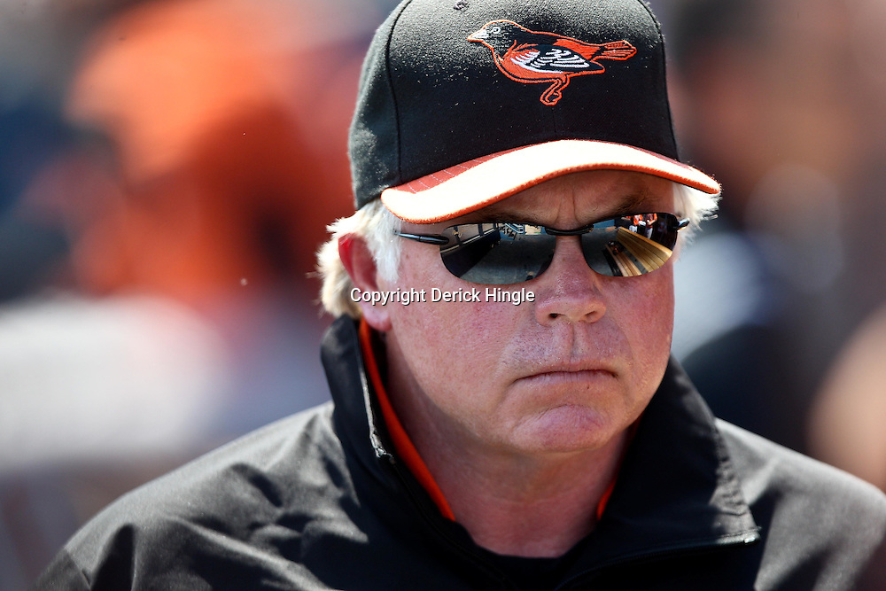 March 20, 2011; Port Charlotte, FL, USA; Baltimore Orioles manager Buck Showalter (26) during a spring training exhibition game against the Tampa Bay Rays at Charlotte Sports Park. Mandatory Credit: Derick E. Hingle