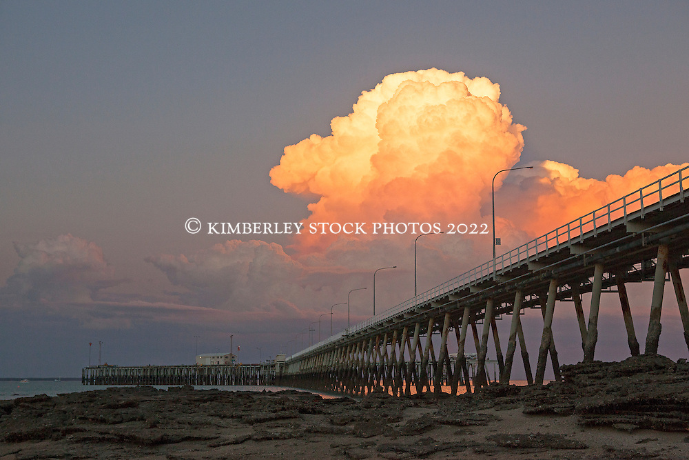 Stunning wet season clouds build up behind the Broome jetty.