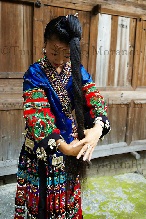 Chine. Province du Guizhou. Village de Xijiang. Miao a jupe de cent plis.// China. Guizhou province. Xijiang village. Skirt Miao.