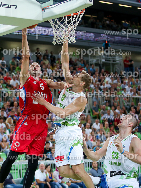 Marko Simonovic of Serbia and Jaka Blazic of Slovenia at friendly basketball match between National teams of Slovenia and Serbia, on August 27 in SRC Stozice, Ljubljana, Slovenia. Photo by Matic Klansek Velej / Sportida August 27, 2015