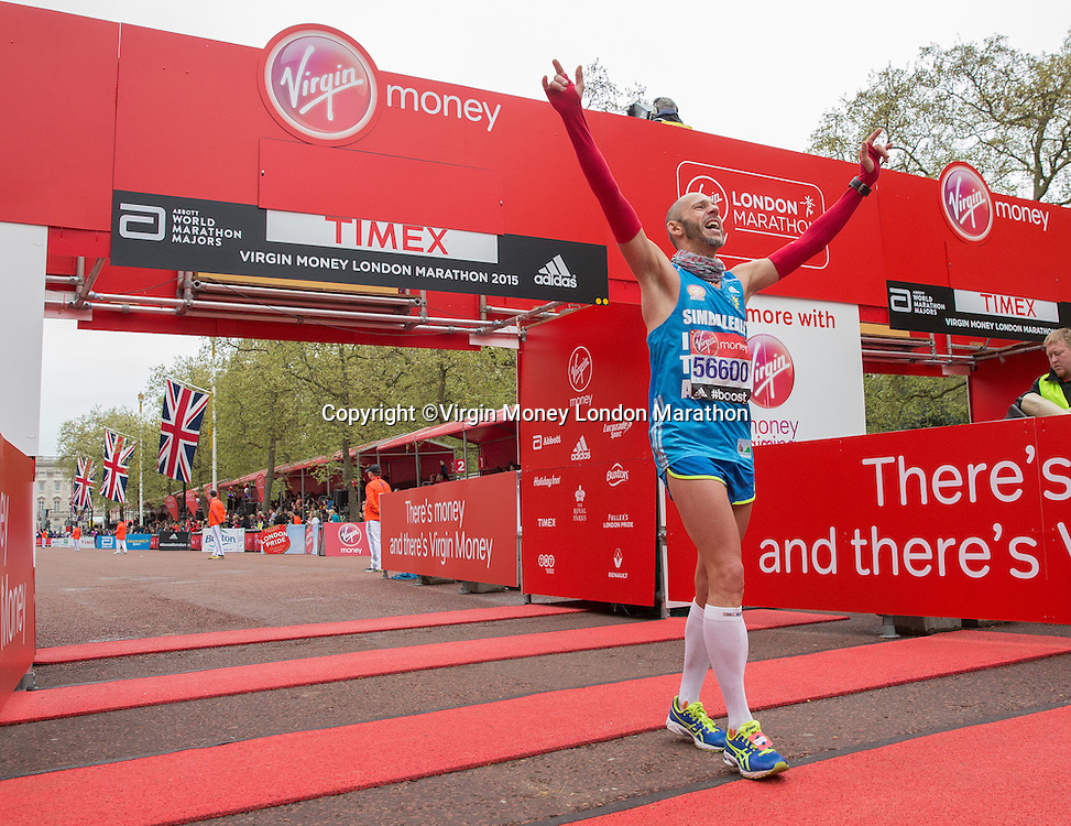 Club runners cross the finishing line at the Virgin Money London Marathon, Sunday 26th April 2015.<br />
<br />
Scott Heavey for Virgin Money London Marathon<br />
<br />
For more information please contact Penny Dain at pennyd@london-marathon.co.uk