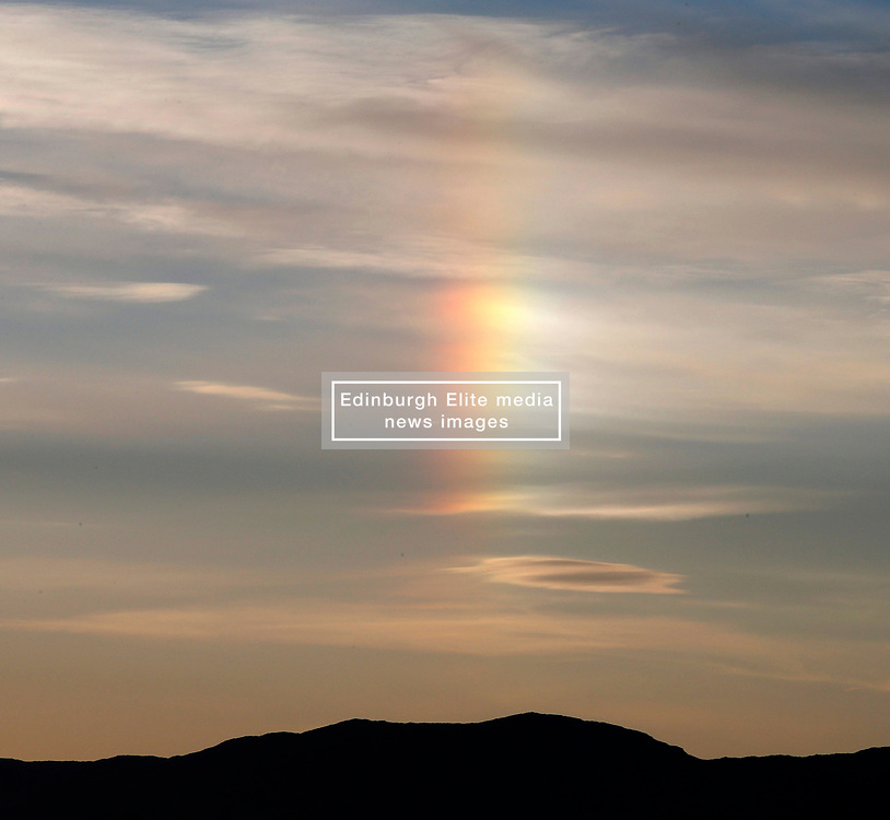 A rare ice rainbow in the sky above the Firth of Lorne this evening. This phenomenon is known as a 'sundog' or Parhelion. A 'sundog' is formed as sunlight passes through ice crystals in the atmosphere which are usually present when thin, wispy cirrus clouds are gathering........ <br />
(c) Stephen Lawson | Edinburgh Elite media